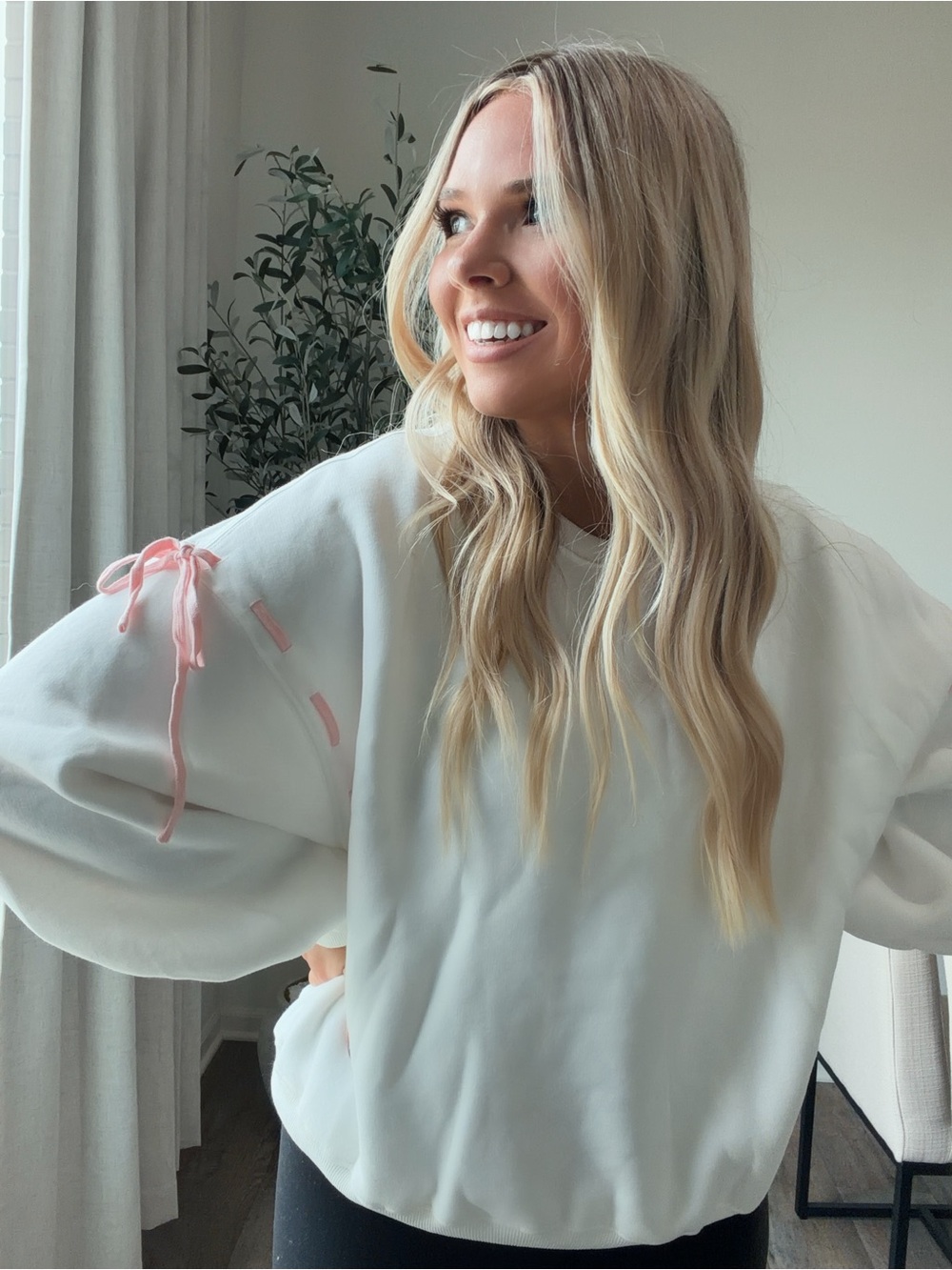 These three white pink bow sweater